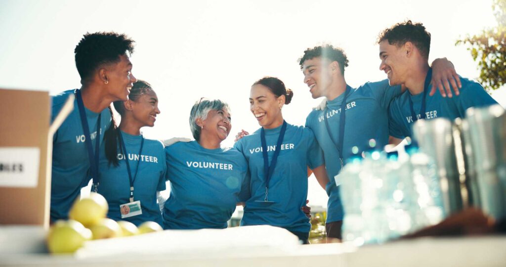 collaborative team working, a smiling group of volunteers